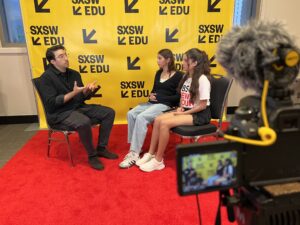 Student reporters interview Yung Pueblo